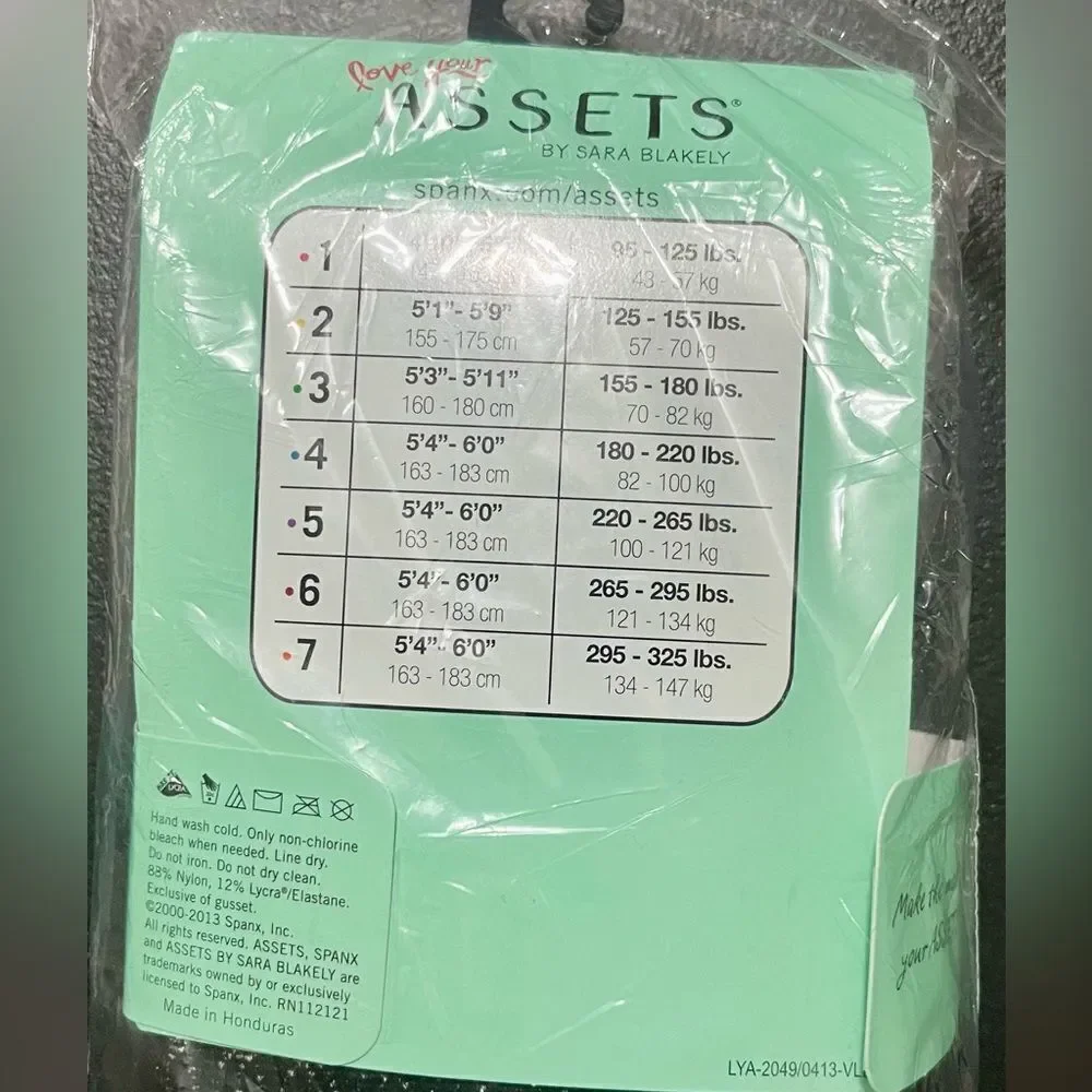 New in package- Assets by Spanx Shaping tights - size 4 wishbone Black